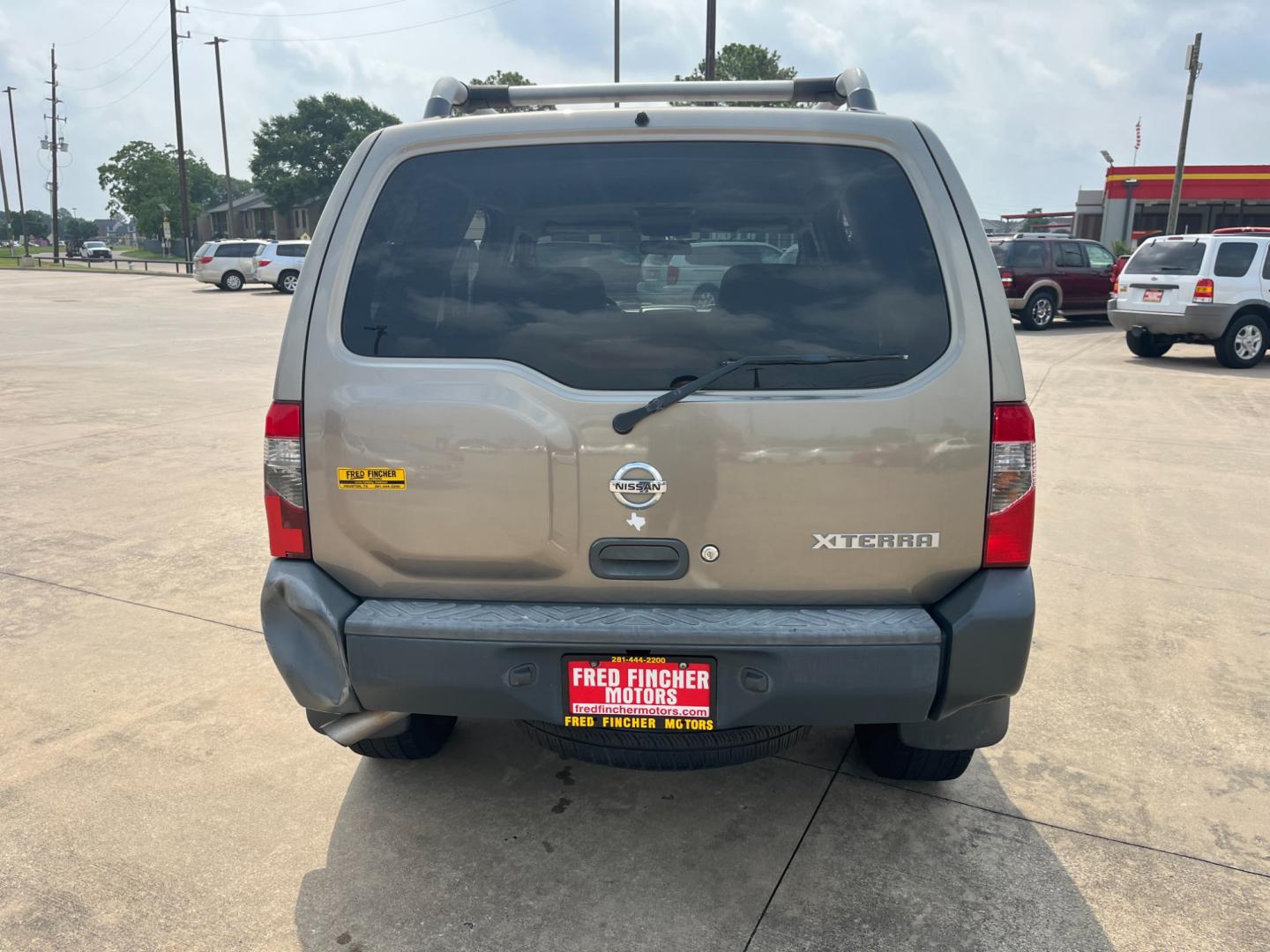 2004 GOLD /gray Nissan Xterra (5N1ED28T84C) , Automatic transmission, located at 14700 Tomball Parkway 249, Houston, TX, 77086, (281) 444-2200, 29.928619, -95.504074 - Photo#5